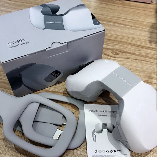 Portable neck massager with packaging and user manual on a wooden surface