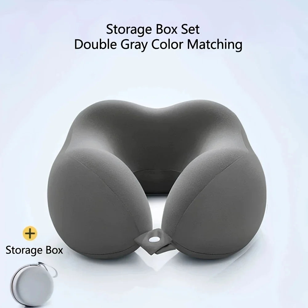 Gray travel neck pillow with matching storage box on a light gray background