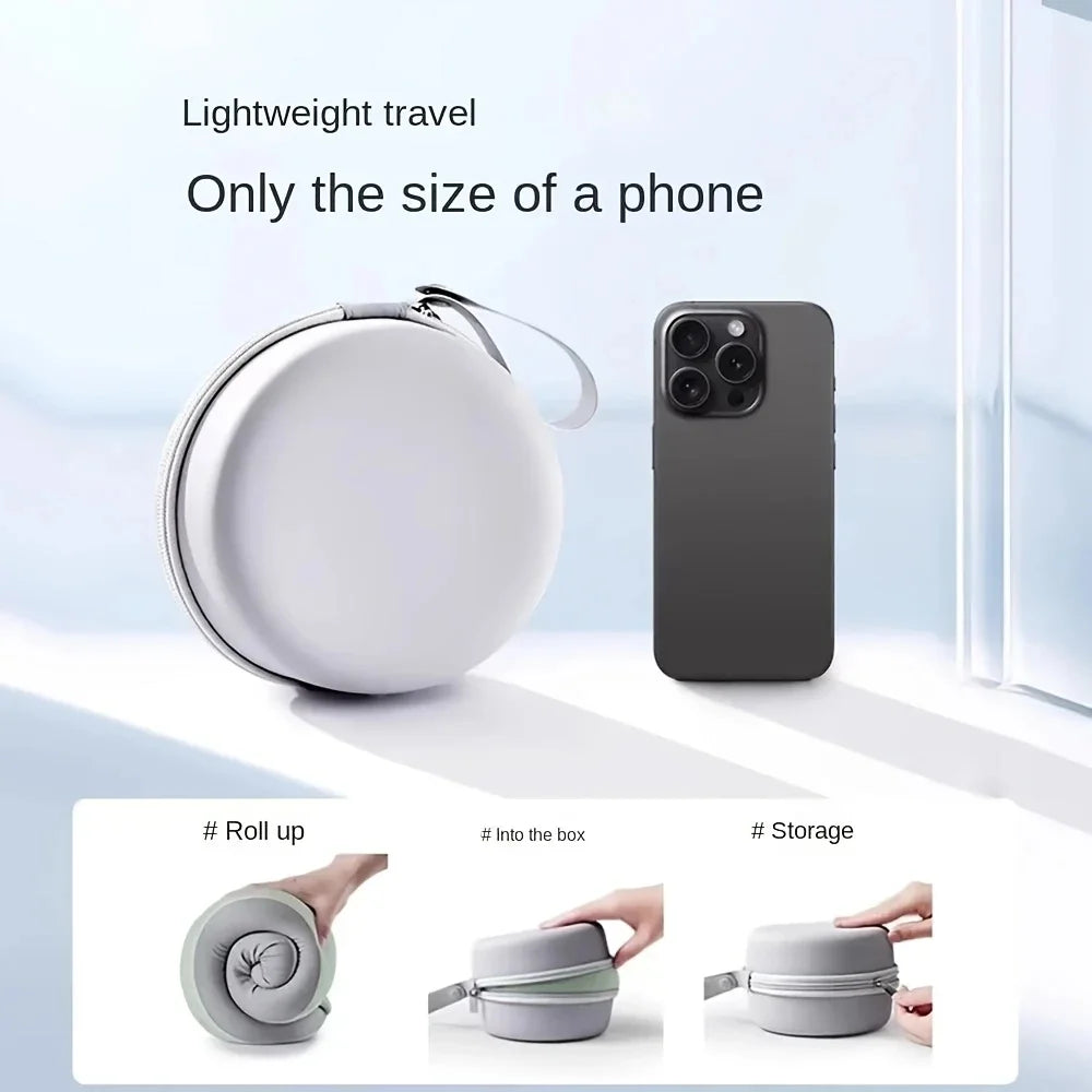 Collapsible travel mug with phone for size comparison on a light blue background