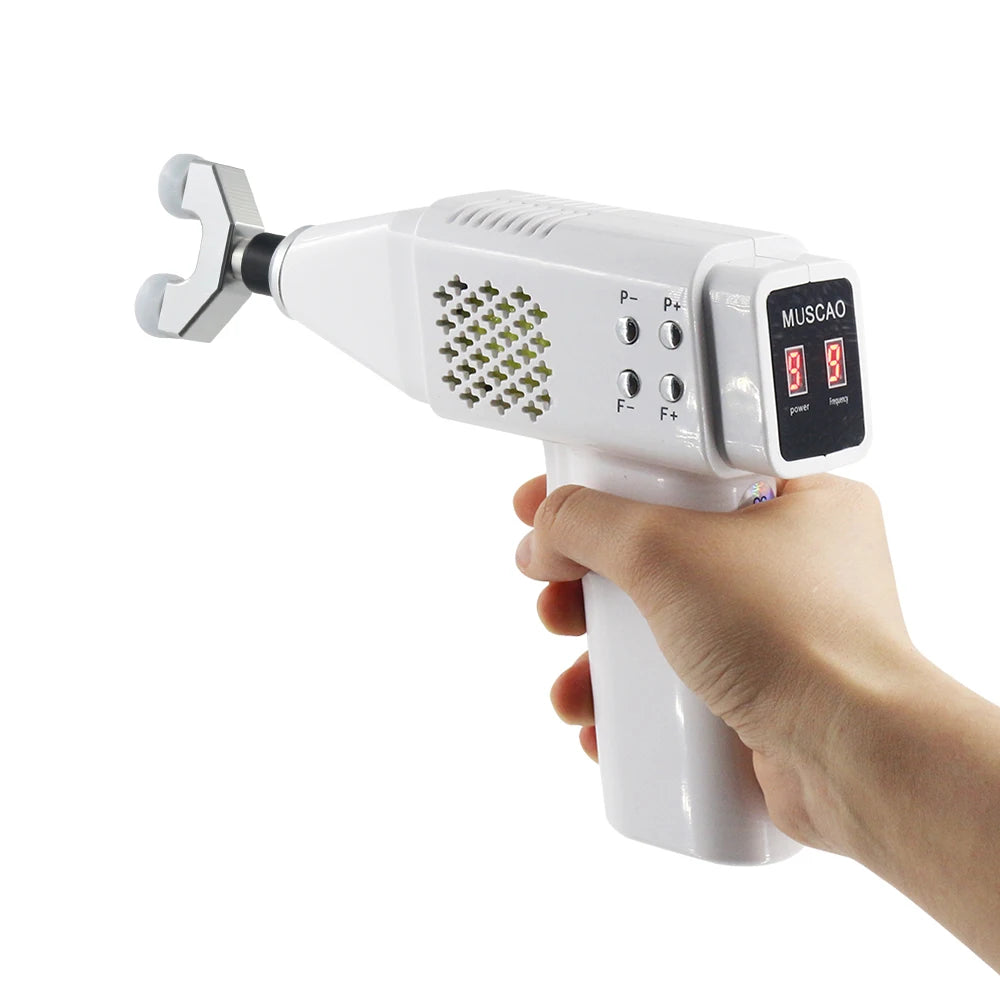 Hand holding massager white handheld device with digital display on a white background