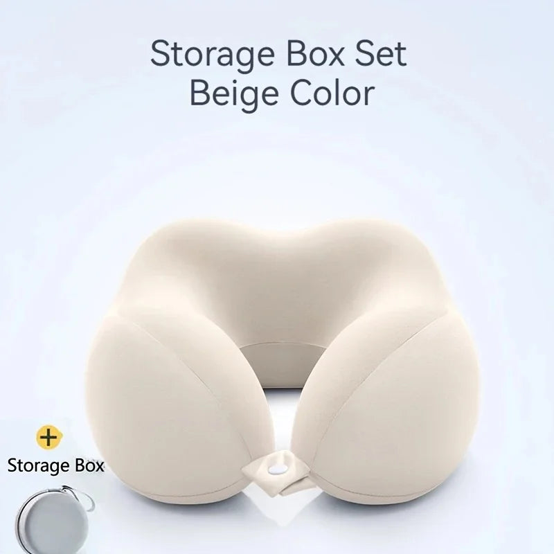 Beige travel pillow with storage box on a light gray background
