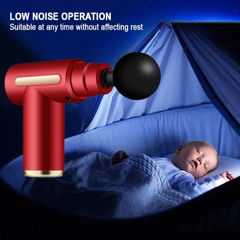 Red and black handheld device with a black ball on top, used for low noise operation, placed over a baby in a crib.